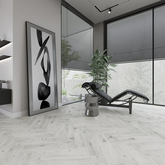 Neptune Silver Stream Oak SPC herringbone flooring in a room setting