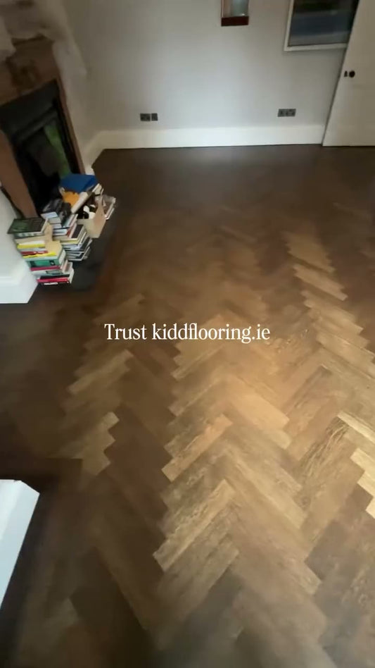 Worn oak herringbone sanded and refinished by Kidd Flooring in Loba Jacobean stain and 2K Duo lacquer