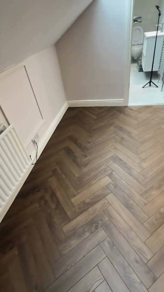 Shannon Oak herringbone laminate fitted by Kidd Flooring