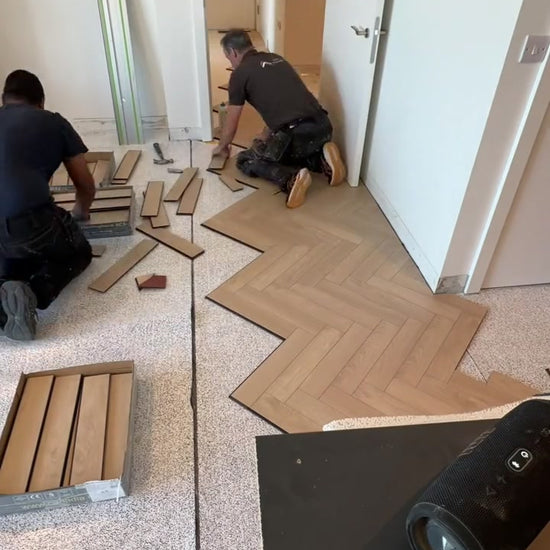 Barrow Oak herringbone being fitted by Kidd Flooring in a Dublin apartment