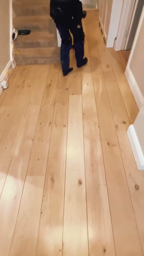 Worn oak floor in Greystones sanded and refinished to a white oak look by Kidd Flooring