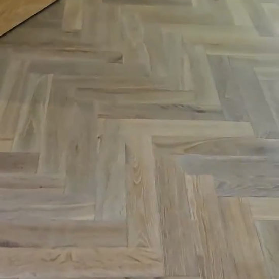 Mountain Ridge Oak herringbone fitted by Kidd Flooring after levelling the subfloor and a liquid DPM