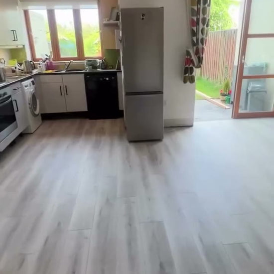 Orchid Oak SPC fitted by Kidd Flooring in place of old floor tiles
