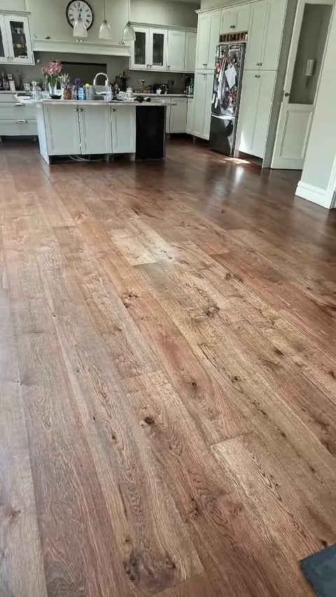 Worn wood floor sanded and stained in Loba Jacobean by Kidd Flooring